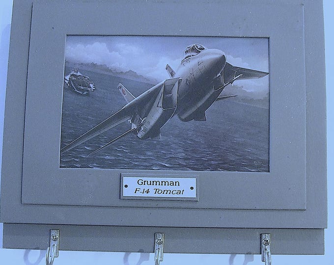 Wall Mounted Keychain Rack with a 4"X6" print of a painting of a Grumman F-14 Tomcat taking off from an aircraft carrier.