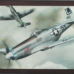 Framed 4&quot; X 6&quot; painting of a WWII North American P-51 Mustang in a dogfight. Designed to hang on a wall or display on a shelf or desk.