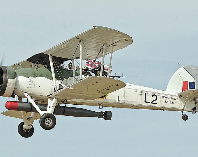 Framed 4" X 6" Print of a British Fairey Swordfish "Stingbag" aircraft.  Made to hang on a wall or display on a shelf or desk.