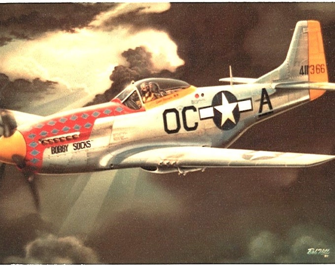 Framed 4" X 6" print of a painting of a WWII P-51K Mustang.  Designed to hang on a wall or display on a shelf or desk.