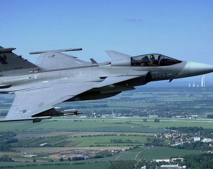 Framed 4" X 6" Print of a SAAB JAS 39 "Gripen". Made to hang on a wall or display on a shelf or a desk.