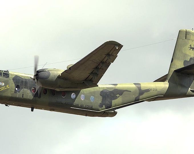 Framed 4"X6" print of a dehavilland Canada DHC-4 (C-7) Caribou Cargo aircraft.  Designed to hang on a wall or display on a shelf or desk.