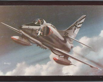 Framed 4" X 6" painting of a McDonnell Douglas A-4 (Skyhawk). Designed to hang on a wall or display on a shelf or desk.