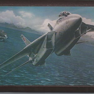 Framed 4&quot; X 6&quot; painting of a Grumman F-14 Tomcat launching from a carrier. Designed to hang on a wall or can be displayed on a shelf or desk