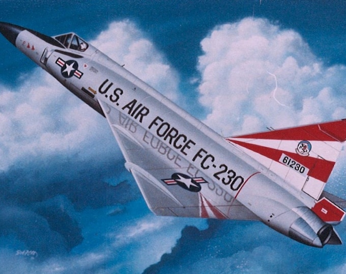 Framed 4" X 6" Print of a painting of a Convair F-102 "Delta Dagger" protecting the homeland. Hang on a wall or display on a shelf or desk.