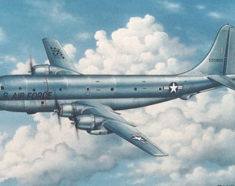 Framed 4" X 6" Print of a Boeing KC-97 "Stratofreighter" tanker on a refueling mission. Hang on a wall or display on a shelf or desk.