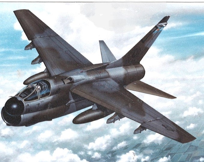 Framed 4" X 6" Print of a painting of an LTV A-7D "Corsair II" over Vietnam. Hang on a wall or display on a shelf or desk.