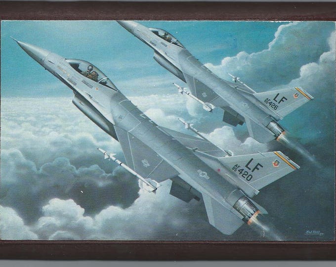 Framed 4" X 6" Print of General Dynamics F-16 Fighting Falcons.  Designed to hang on a wall or can be displayed on a shelf or desk.