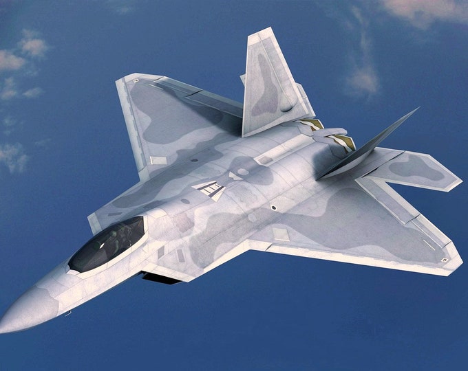 Framed 4" X 6" Print of a Lockheed Martin F-22 "Raptor" in hot pursuit of its prey.  Hang on a wall or display on a shelf or a desk.