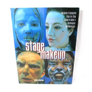 May include: Book cover with the title "stage makeup" in red and black letters. The cover features four close-up images of faces with different stage makeup looks. The Actor's Complete Step-by-Step Guide to Today's Techniques and Materials.