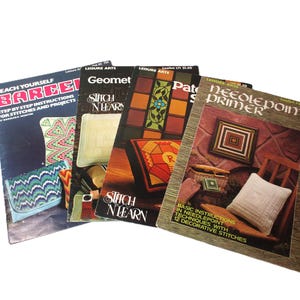 May include: Five needlepoint pattern books with colorful covers. The titles are "Teach Yourself Bargello", "Geometric Stitch 'n Learn", "Patchwork Stitch 'n Learn", "Needlepoint Primer", and "Needlepoint".