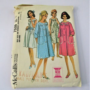 May include: Vintage McCall's sewing pattern for a nightgown and robe. The pattern is for half sizes and women's sizes. The pattern is printed on a white background with a blue and white polka dot design. The pattern number is 7539.