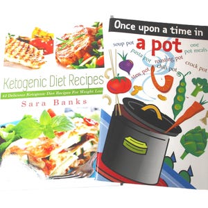 May include: Two cookbooks are displayed. One is titled "Ketogenic Diet Recipes" by Sara Banks, featuring images of food. The other book is titled "Once upon a time in a pot", with illustrations of vegetables and a cooking pot.
