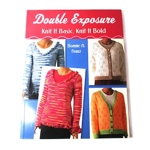 May include: Book cover with the title "Double Exposure: Knit It Basic, Knit It Bold" by Bonnie A. Franz. The cover features four different knitted sweaters in various colors and patterns.