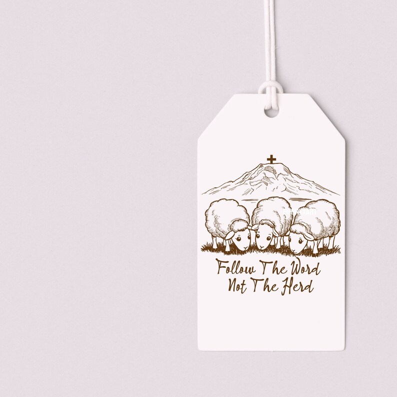 May include: A white tag with a brown line drawing of a mountain with a cross on top and four sheep looking down at the text "Follow The Word Not The Herd".