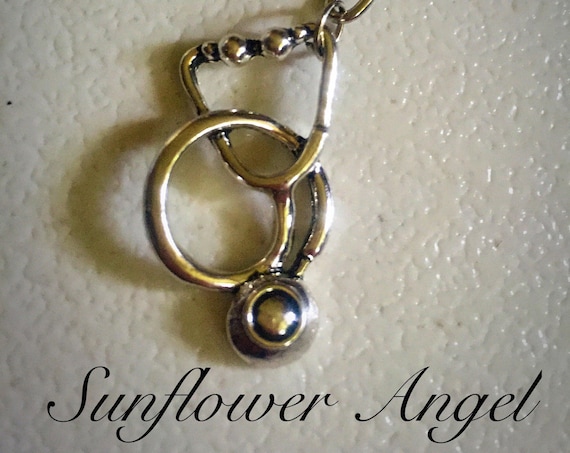 Stethoscope keyring. In vintage silver. Doctor, nurse medical.