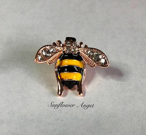 Bee pin, decorated with enamel and diamante, with squeeze pin closurer.