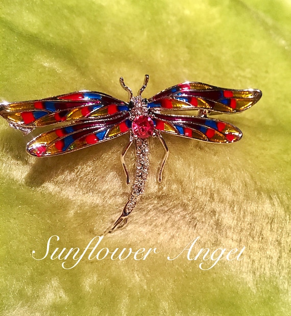 Dragonfly diamante brooch, stunning sparkles in this art deco style brooch, with multi coloured enamel wings, sent out in a gift boxed.