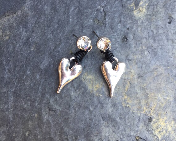 Earrings, with diamante stud, with streatched heart, joining with black leather wrap around