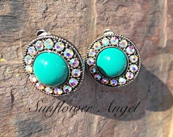 Clip on Earrings, with acrylic turquoise centre and surrounded with diamanté.