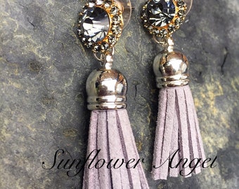 Glamourous grey crystal earrings, with a suedette tassel. For pierced ears.