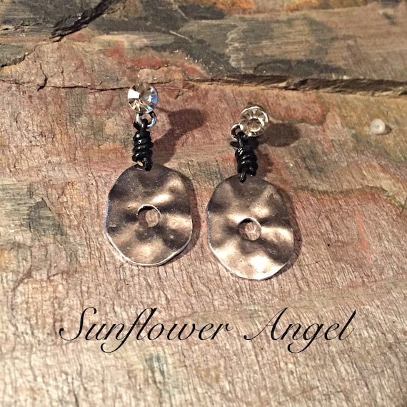 Earrings, with diamante stud, with metal disc, joining with black leather wrap around