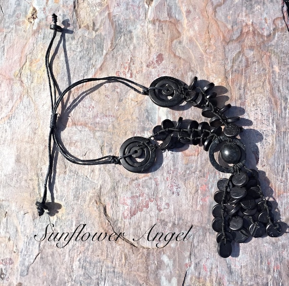 Wooden necklace, Vibrant black Lagenlook Necklace, With coconut shell discs, abstract pieces.