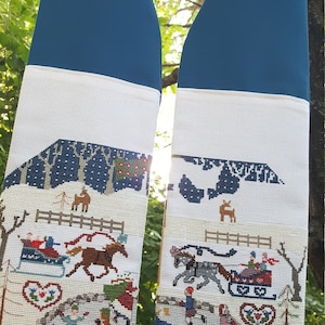 blue clergy stole with detailed winter cross stitched scene