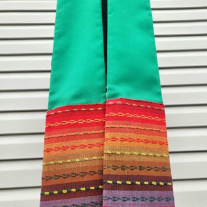 Green clergy stole: rainbow woven accent fabric