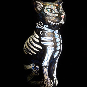 Sugar skull black cat. Paper sculpture, papier maché, papercraft, cartonería, mexican skulls. Traditional artcraft. Day of the dead