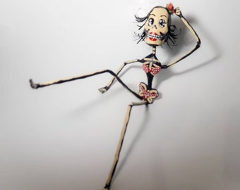 Pin-up girl, skeleton girl, bikini girl, Mexican skull, papercraft, paper sculpture, papier-mâché, cartonería, Day of the Dead.