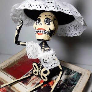 Catrina, caveira mexicana, caveira de açúcar, escultura em papel, papel machê, papercraft, dia dos mortos. Dia dos Mortos.