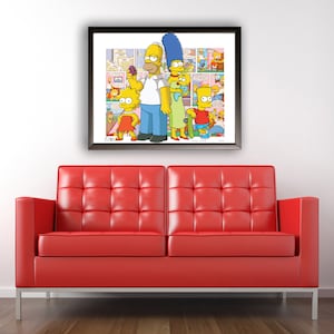 May include: A framed print of the Simpsons family, including Homer, Marge, Bart, Lisa, and Maggie, in a comic book style. The print is in a black frame and has a white background.
