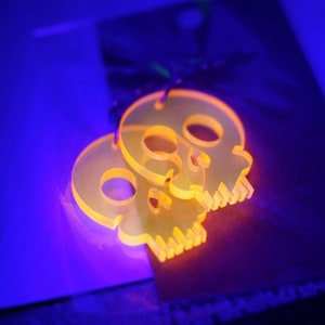 Fluorescent Orange Skull Earrings