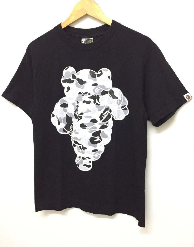 Bape X Kaws >> Vintage A Bathing Ape Bape X Kaws Michelin Camo Chums Tee Etsy Bape X Kaws >> Vintage A Bathing Ape Bape X Kaws Michelin Camo Chums Tee Etsy