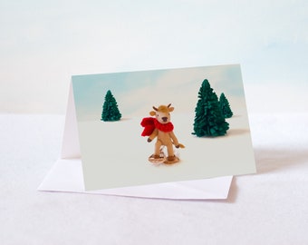 One blank greeting card of Cow snowshoeing