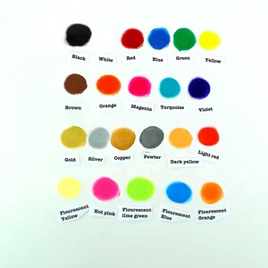 May include: A collection of paint swatches in various colors, including black, white, red, blue, green, and yellow. Additional colors include brown, orange, magenta, turquoise, violet, gold, silver, copper, pewter, dark yellow, light red, hot pink, fluorescent lime green, fluorescent blue, and fluorescent orange.