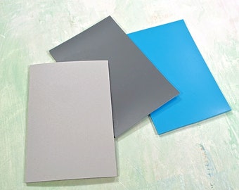 Lino for printmaking, mixed quality 3 piece pack, size A6 (10x15cm) blue softcut + grey mid density + traditional hessian back