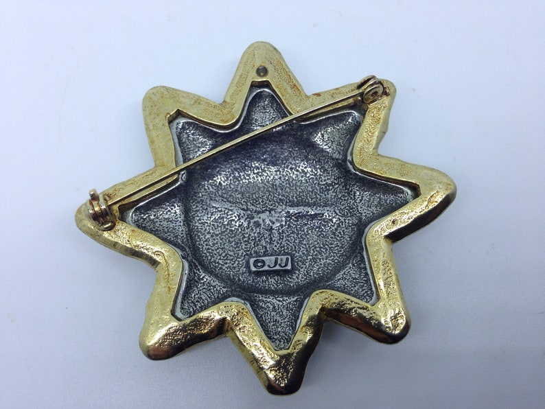 Jonette jewellery sun brooch signed