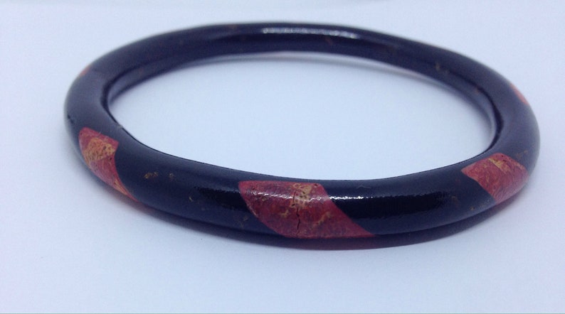 Black coral inlaid vintage bangle