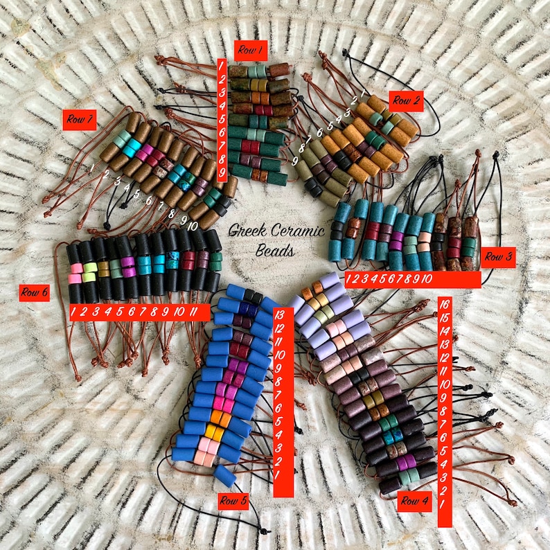 May include: Assortment of colorful ceramic beads arranged in rows on a light brown surface. Each row is numbered and labeled with the word "Row". The beads are various shapes and sizes, with some having a speckled or marbled appearance. The text "Greek Ceramic Beads" is written in the center of the image.