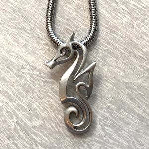 Seahorse Necklace is minimalist and modern in design.  Perfect Sea Life Jewelry design for Gift giving.