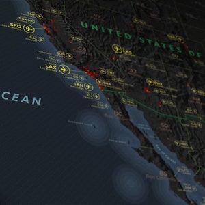 May include: A map of the United States showing major cities and airports. The map is dark grey with green state borders and red dots indicating cities. The Pacific Ocean is shown in blue. The text "UNITED STATES OF AMERICA" is visible in green.