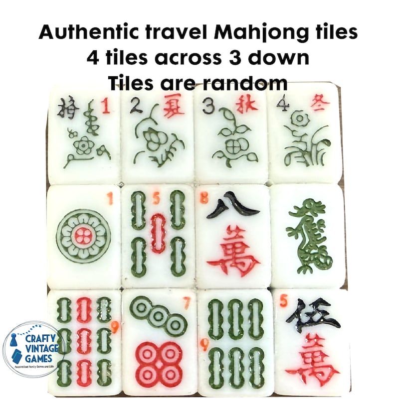 May include: A set of twelve white Mahjong tiles arranged in a four-by-three grid. Each tile features engraved symbols, characters, and numbers in red, green, and black ink. The text Authentic travel Mahjong tiles 4 tiles across 3 down Tiles are random appears above the tiles.