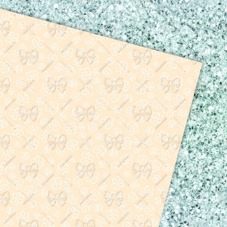 May include: A pale peach background with a repeating pattern of white outline bows. The background is split diagonally with a teal glitter background.