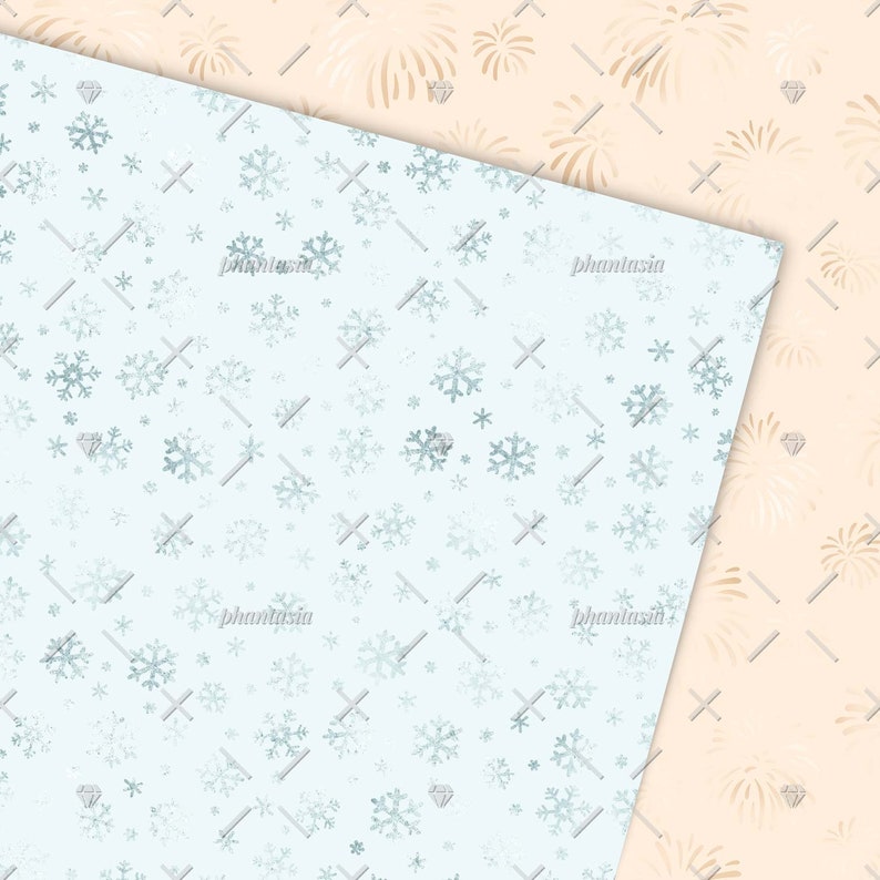Peut inclure: Un pack de papier num&eacute;rique avec deux motifs sans couture. Un motif pr&eacute;sente un fond bleu clair avec des flocons de neige blancs et un motif en diamant. L'autre motif pr&eacute;sente un fond p&ecirc;che avec un motif en diamant blanc et un motif de feu d'artifice dor&eacute;.