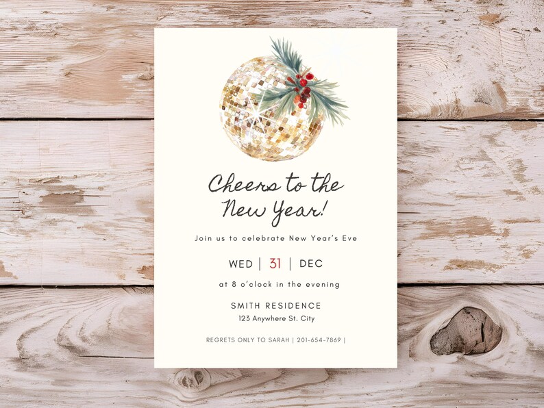 May include: New Year's Eve invitation with a watercolor design. The invitation features a gold glitter ball with green sprigs and red berries. Text reads "Cheers to the New Year!" and details the date, time, and location.
