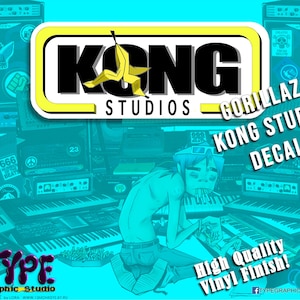 May include: A black and yellow vinyl decal with the text "KONG STUDIOS - GORILLAZ KONG STUDIO DECAL!"  The decal features a cartoon banana and a cartoon character playing a keyboard. The text "High Quality Vinyl Finish!" is also included.