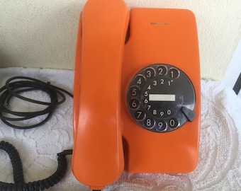 Vintage rotary dial telephone Siemens (Orange color)