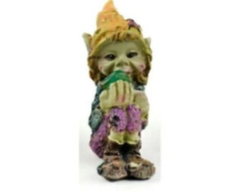 Miniature Pixie Holding a Green Gem Figurine
